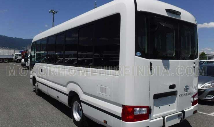 13 14 seater toyota coaster imported mini coach hire in delhi india